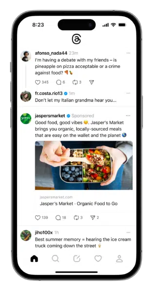 iPhone displaying a Threads feed